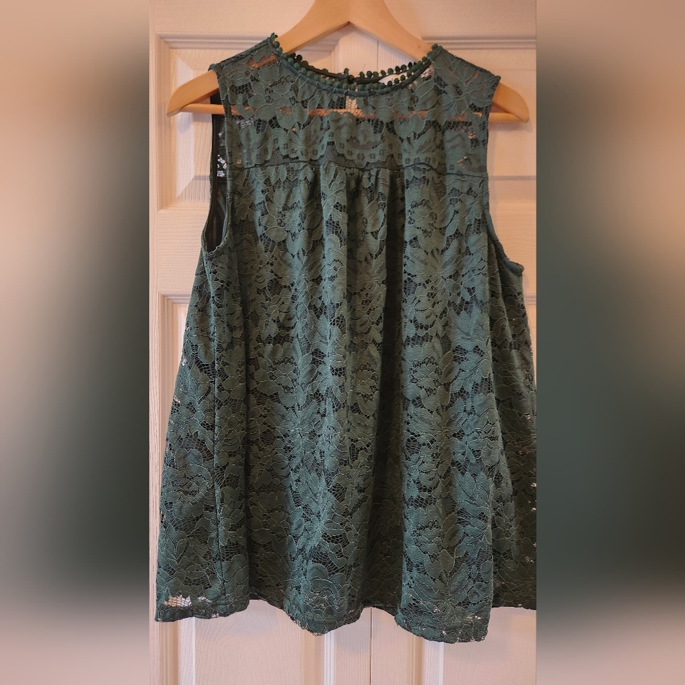Green lace overlay sleeveless top.